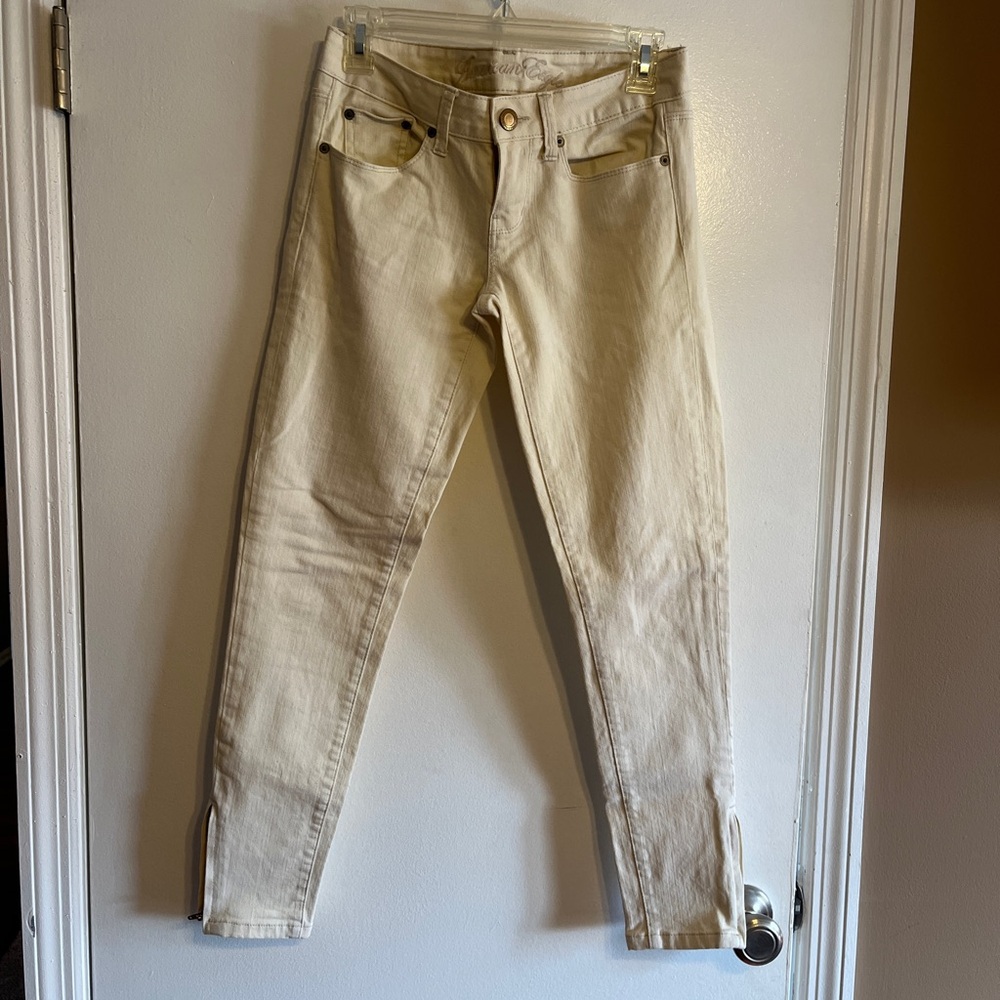 American eagle pale yellow skinny jeans with zip ankle size 0